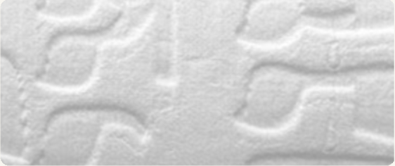 Embossed molded pulp surface